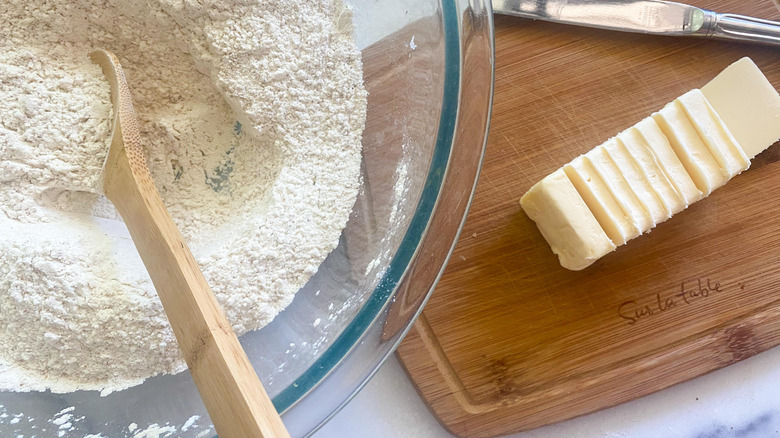 sliced butter next to bowl 