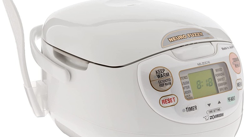 A white Zojirushi rice cooker on a white background