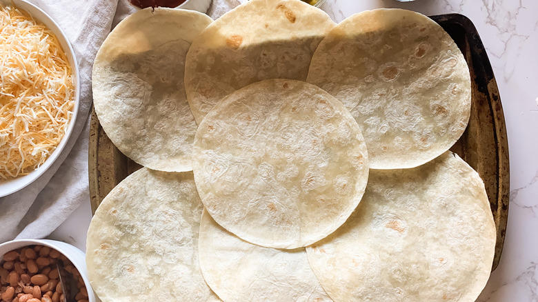 flour tortillas on sheet pan