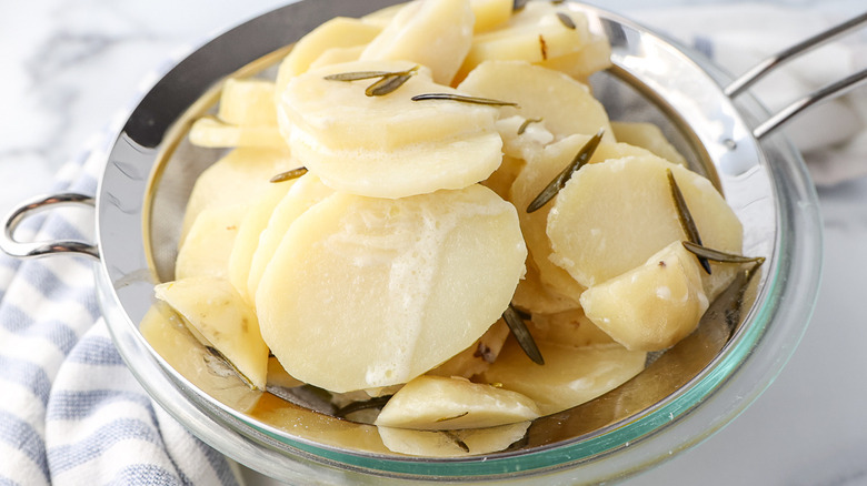 potatoes in strainer