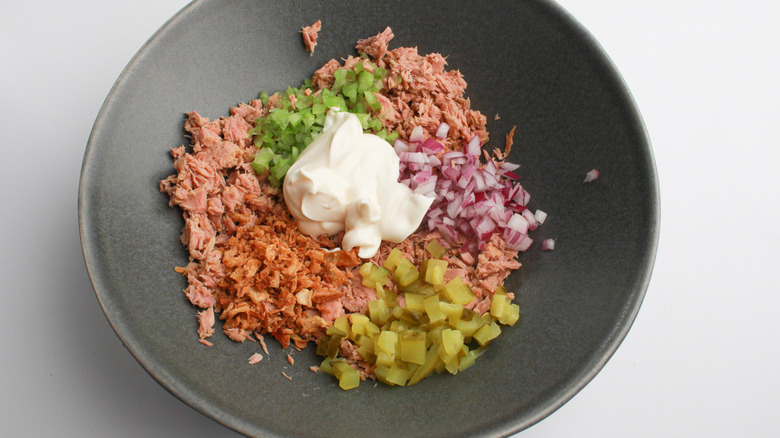 tuna salad ingredients in bowl