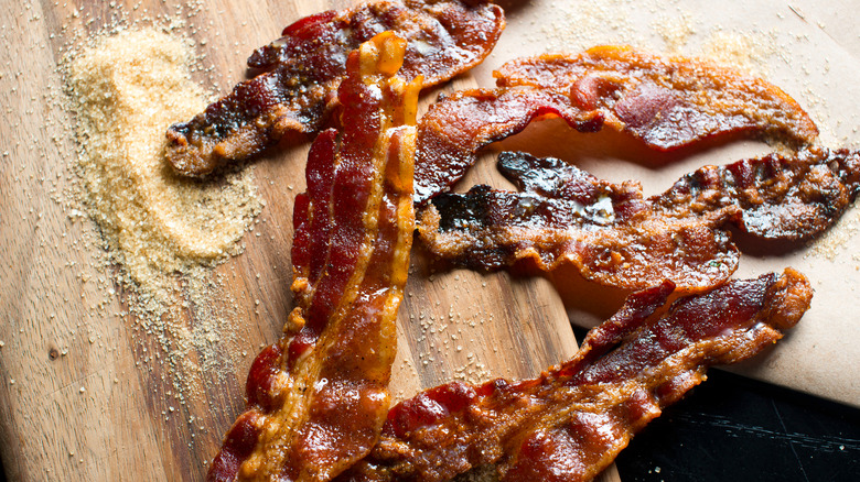 caramelized bacon on wooden board