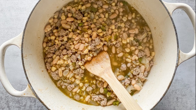 Turkey chili in a white Dutch oven