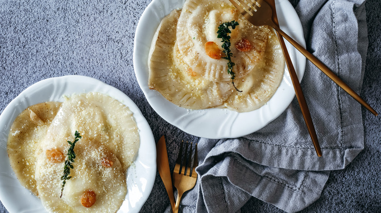 wonton ravioli plated with cutlery