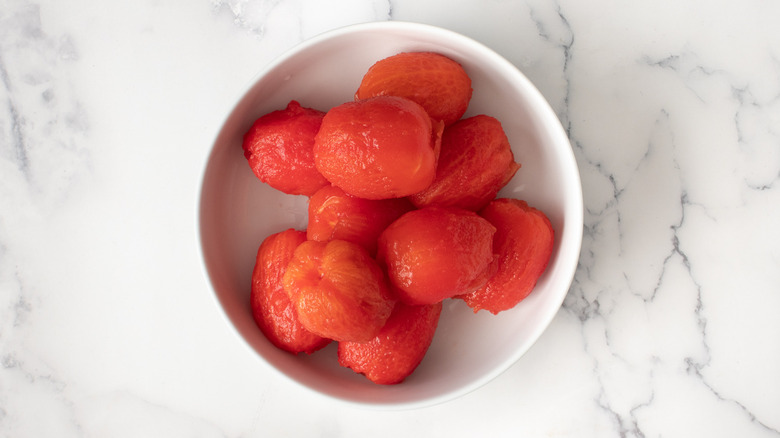 peeled tomatoes in bowl 