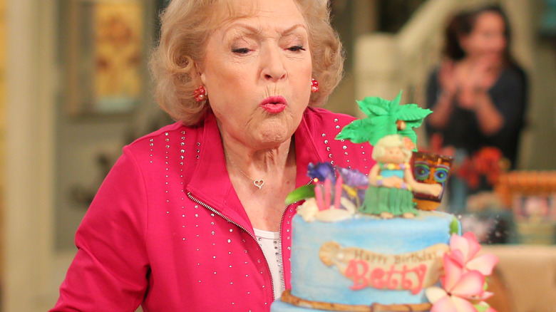 Betty White blows out candles on birthday cake