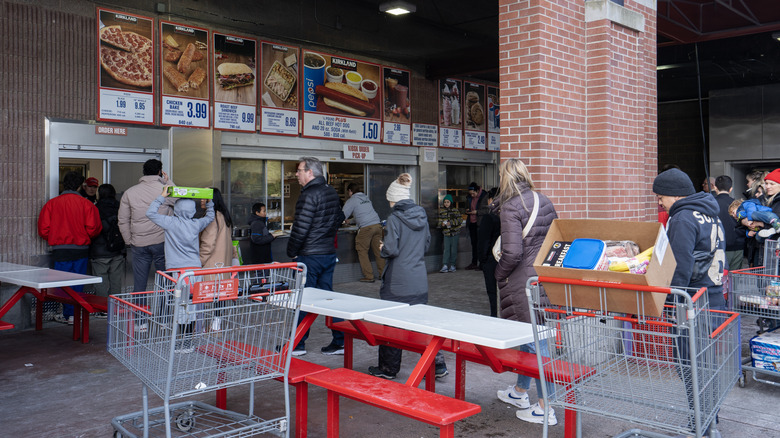 Customers in line at Costco outdoor food court