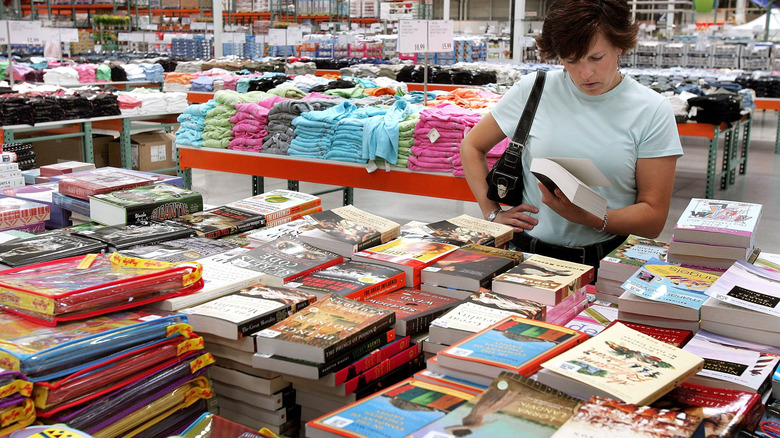 Customer looking at books at Costco