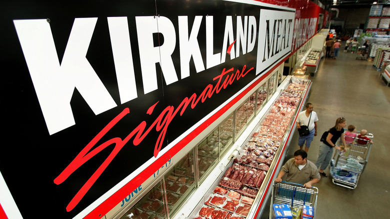 Store banner advertising Kirkland Signature products at Costco