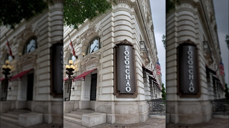 Fogo de Chão exterior with flags