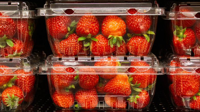 plastic containers of strawberries