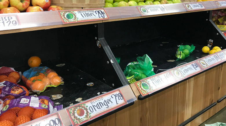 sparsely stocked produce section