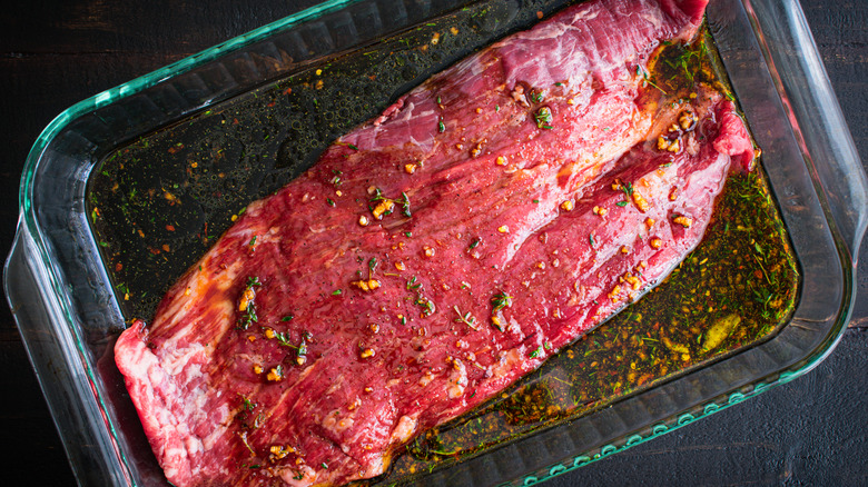 seasoned beef marinating in dish