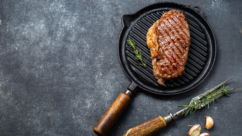 steak on cast iron pan