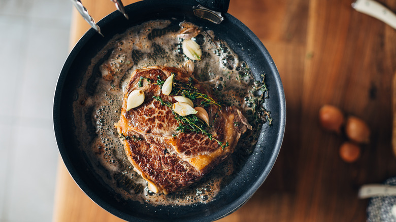 Ribeye steak with garlic