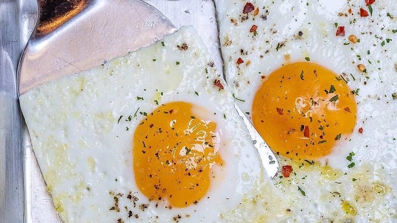 spatula and one sheet pan fried egg