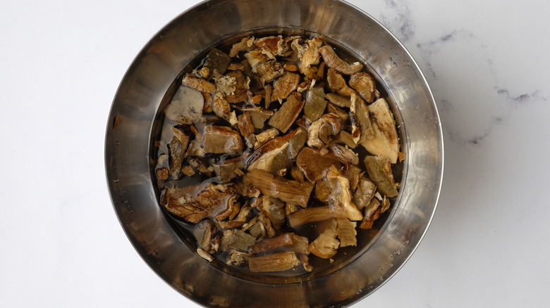 dried porcini mushrooms soaking in bowl