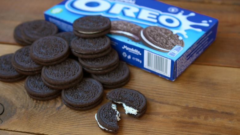 pile of Oreos beside box