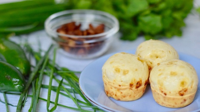  three pao de queijo on plate