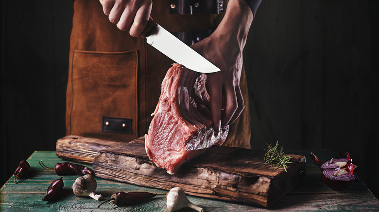 Person carving meat