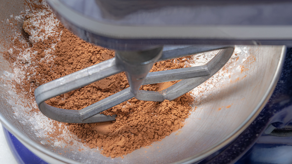 mixing dry ingredients for black forest cake recipe cake batter