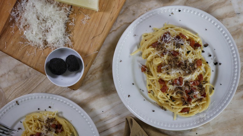 plated black truffle carbonara