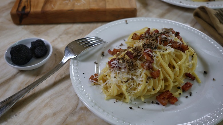 plated black truffle carbonara