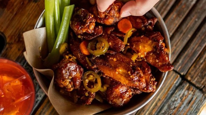 spicy wings with celery and peppers