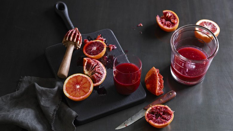 Sliced and juiced blood oranges