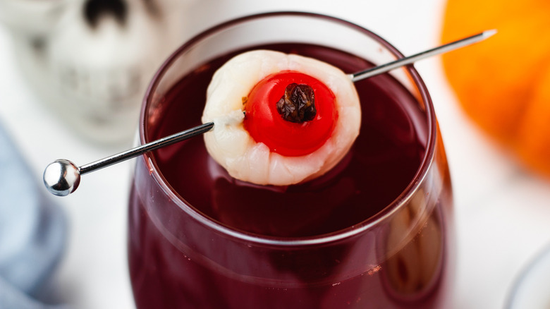 Close up of beetroot cocktail with edible eyeball