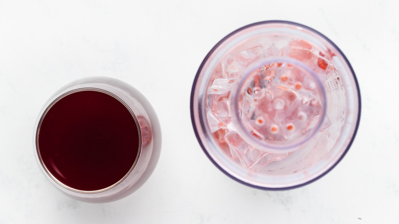 Beetroot cocktail strained into glass