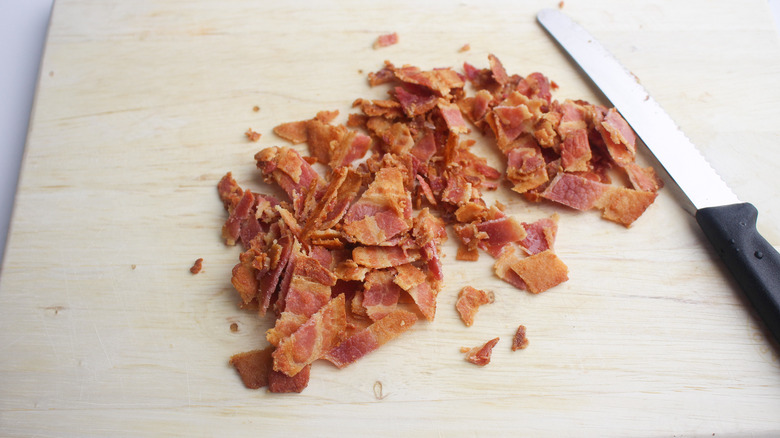 chopping bacon into bits