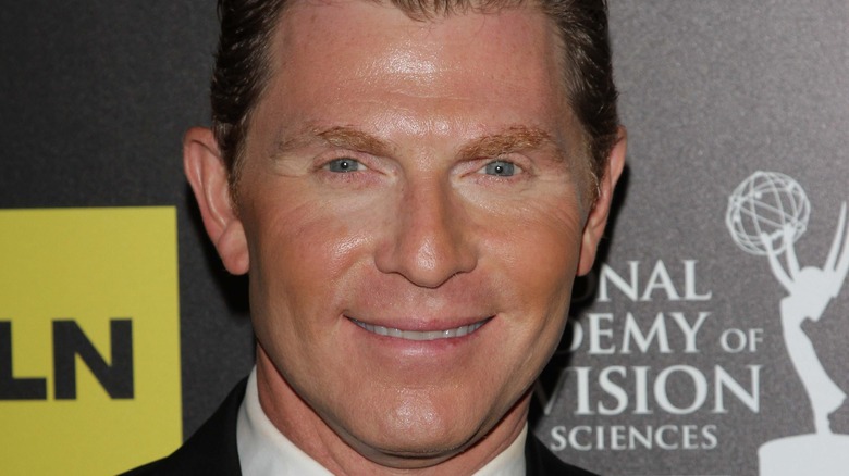 Bobby Flay smiling at event 