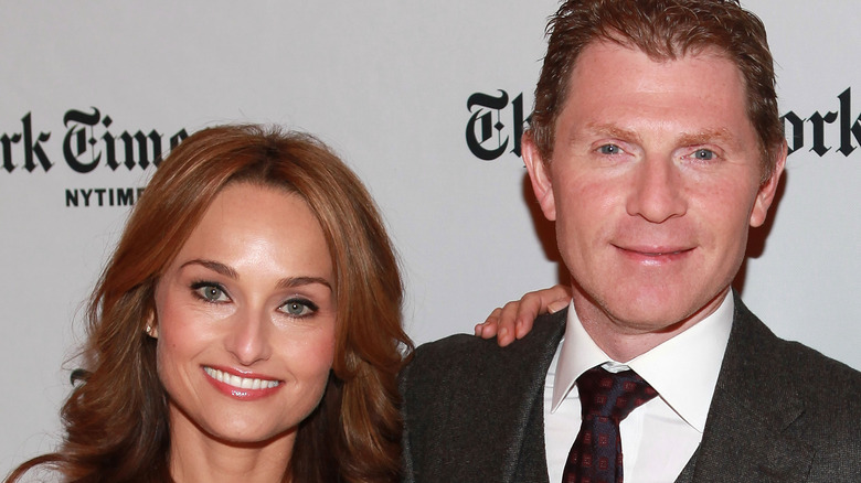 Giada De Laurentiis and Bobby Flay smile side by side