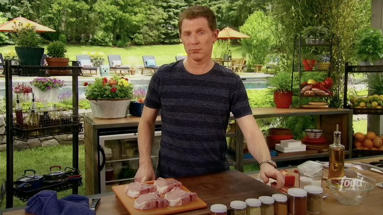 Bobby Flay seasoning meat