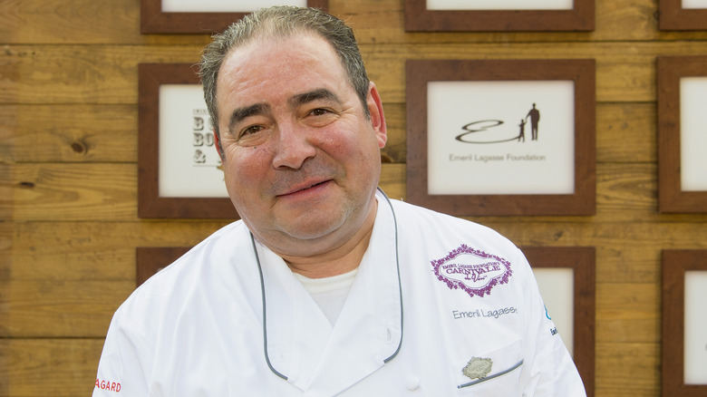 emeril lagasse in front of frames