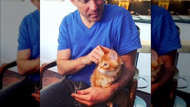 Bobby Flay with Nacho Flay as a kitten