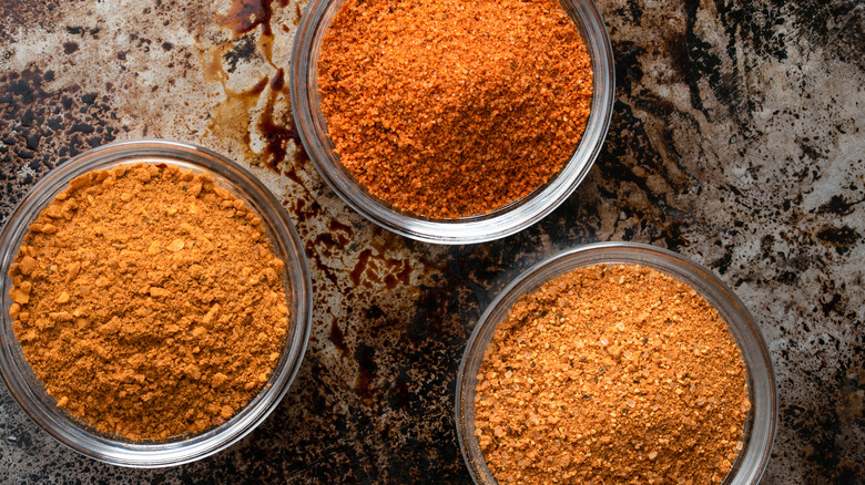 various spice rubs in bowls