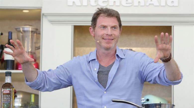 Bobby Flay cooking on set