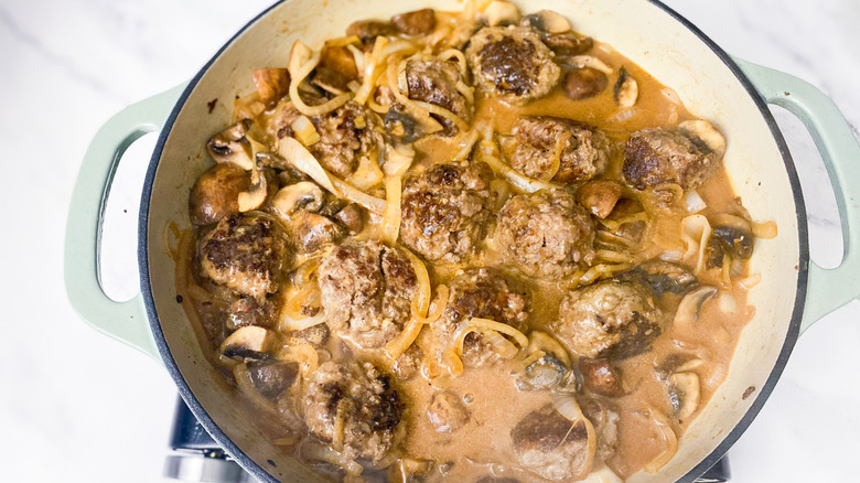 meatballs cooking in sauce