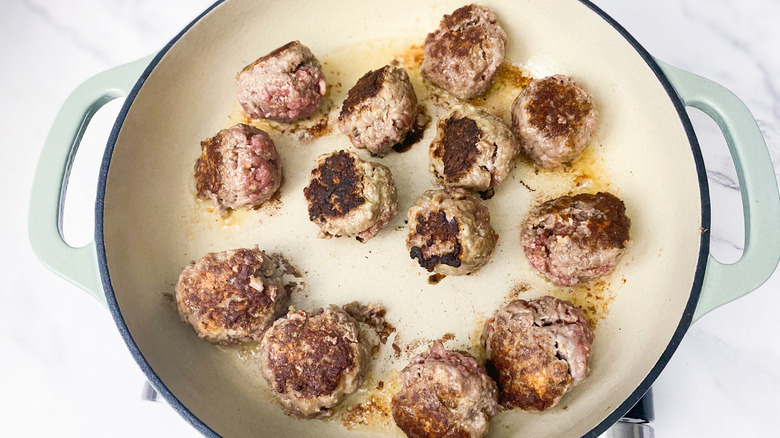 meatballs cooking in pot