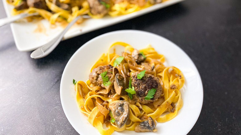 plated meatballs over pasta