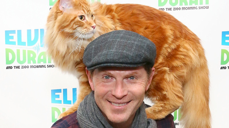 Bobby Flay and his cat, Nacho