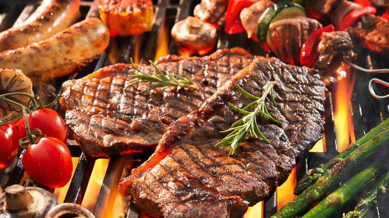 Steak and vegetables on a grill