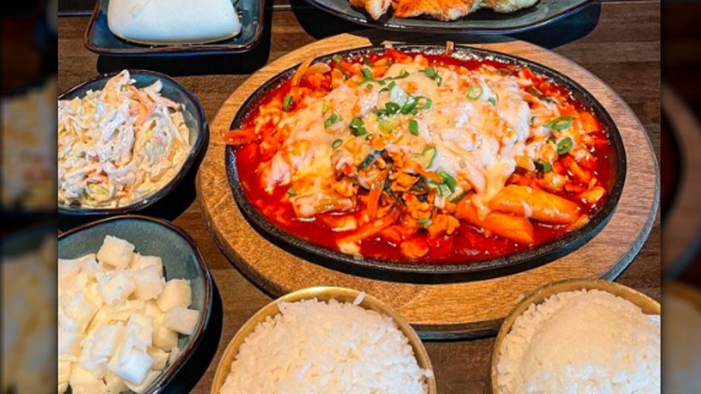 Tteokbokki surrounded by sides