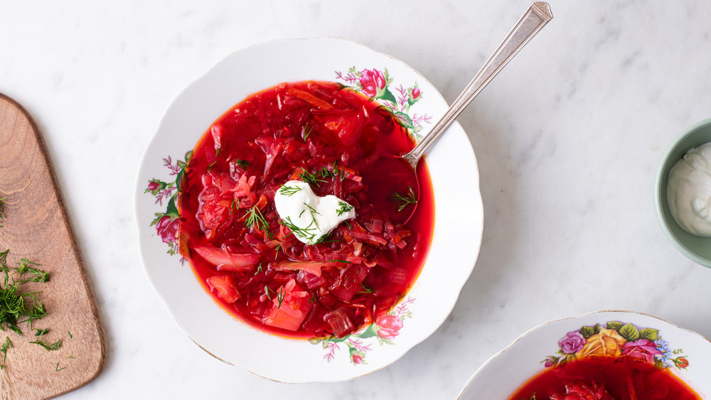 Bowl of borscht with sour cream and dill