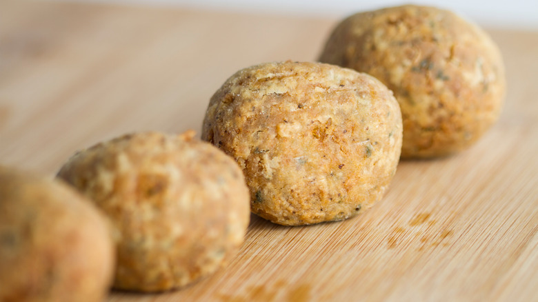 Boudin balls on wooden surface