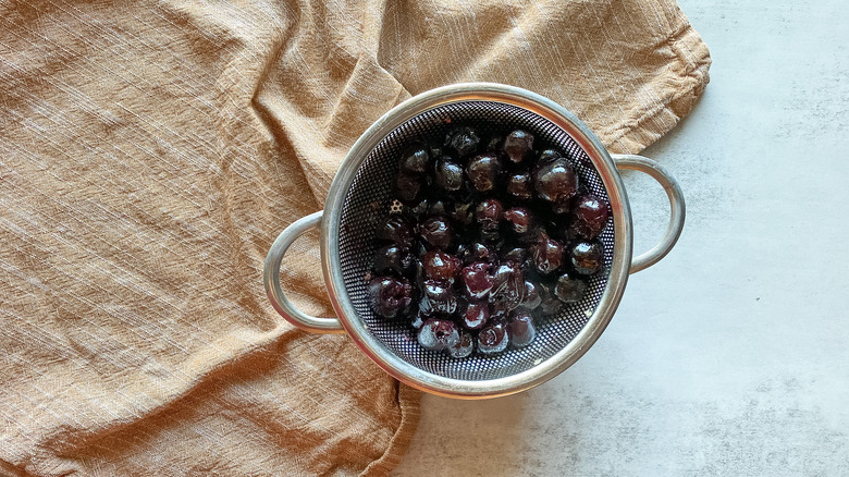 draining cherries in colander