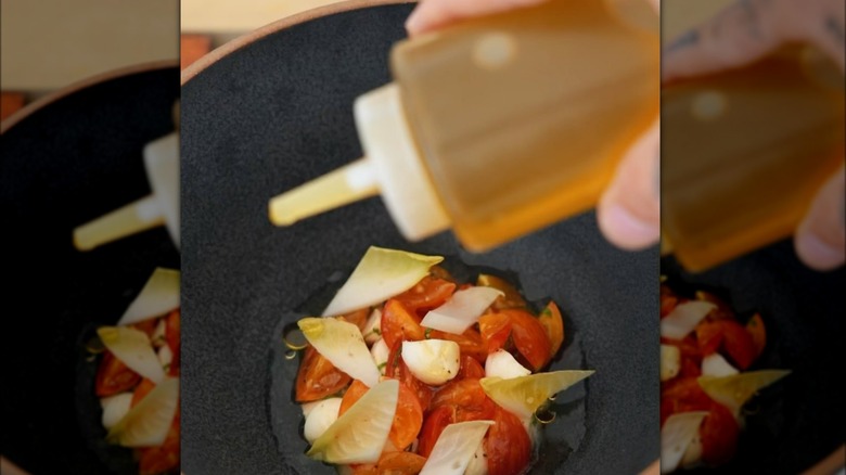 squeeze bottle garnishing tomato salad