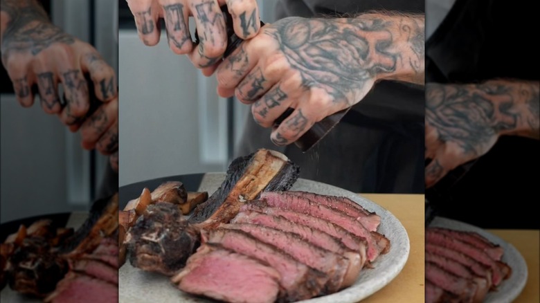 skier grinding pepper over steak